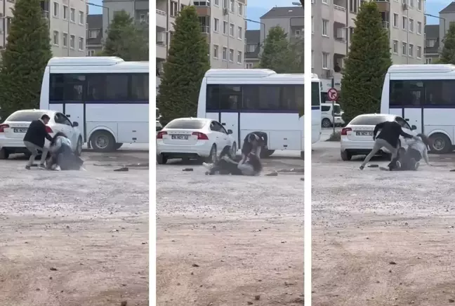 İki genç kız otoparkta yumruk yumruğa kavga etti